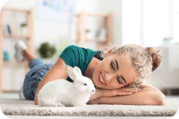 bunny rabbit with owner at home