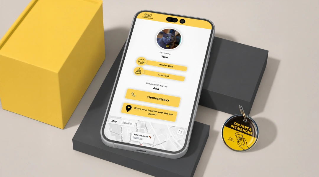 A close-up of a smartphone featuring pettap app | The Pet Tap | The Pet Tap Mobile app screen showing a pet profile for Tom (Russian Blue, 1 year old) with owner Ana and a 'Share your location' button, plus a map preview at the bottom.